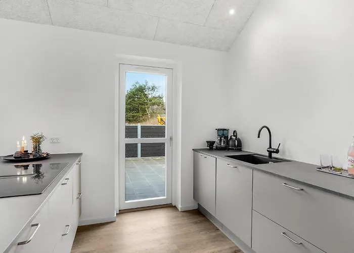 Сasa de vacaciones In With Kitchen